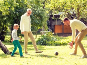 Older man playing with a ball